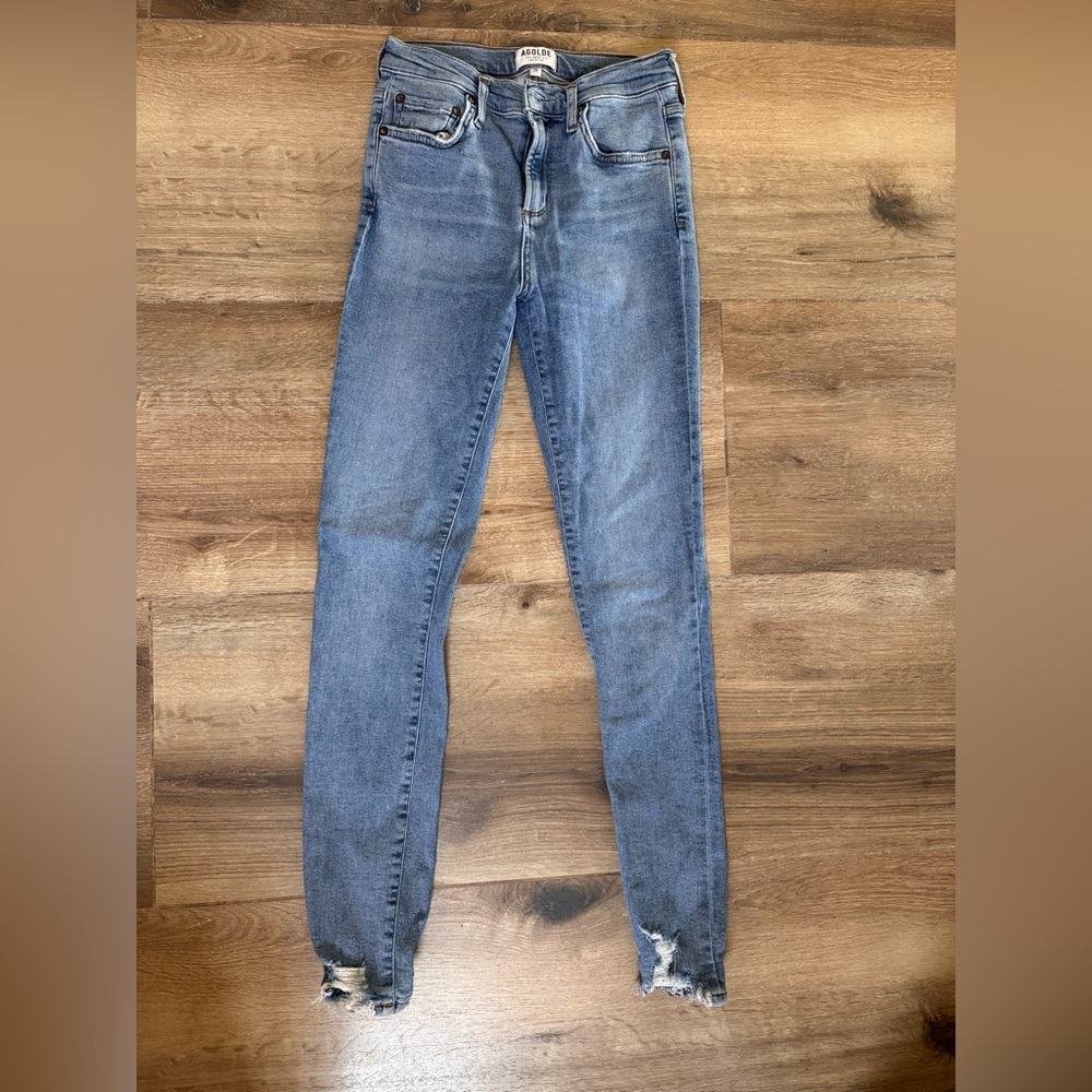 A gold E only worn once frayed bottom.